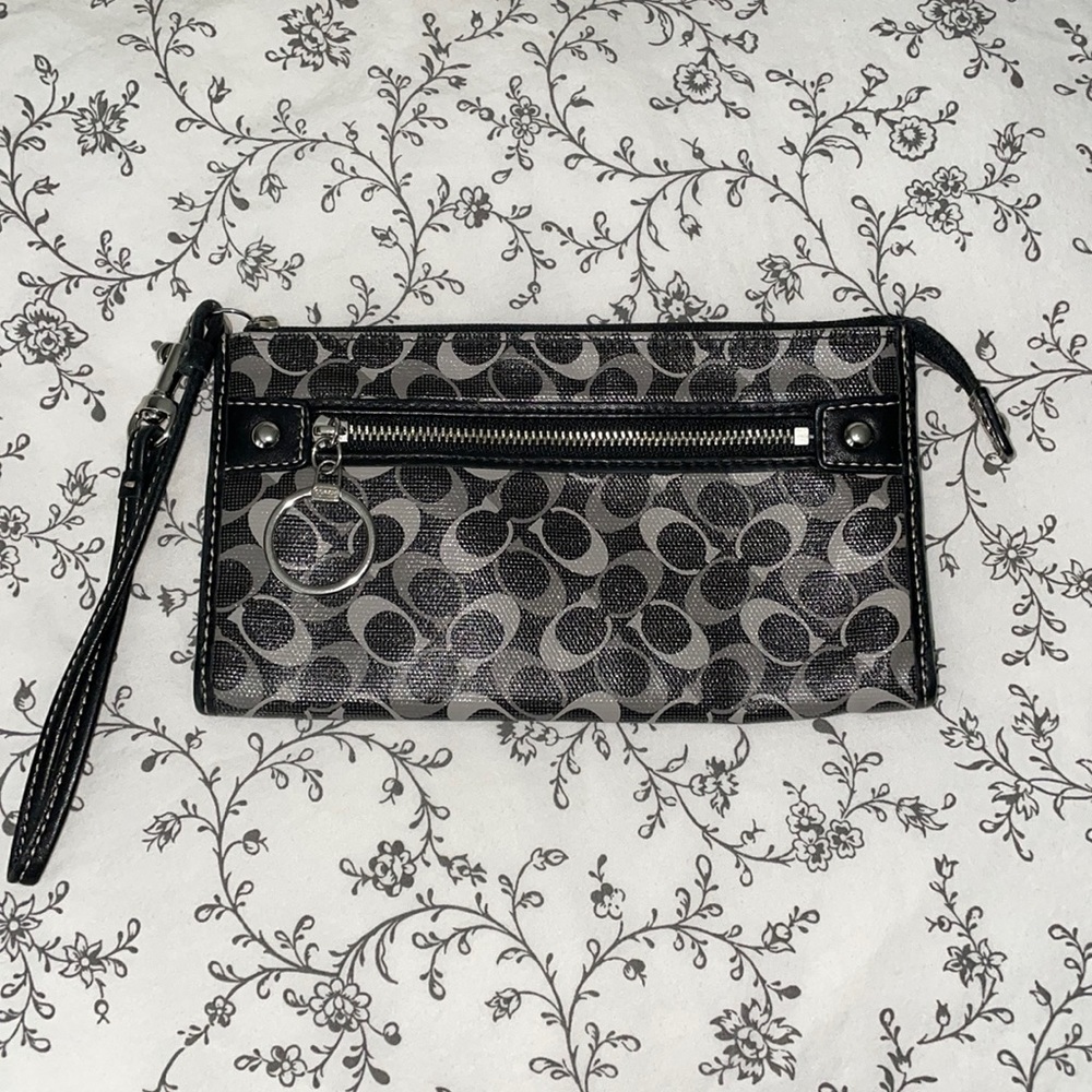 Coach coated signature zip wallet wristlet.